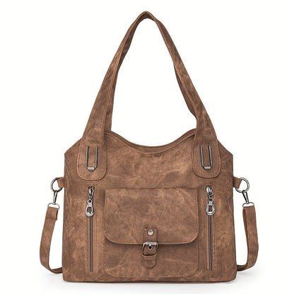 Brown suede-look shoulder bag with top handles, flap pocket, and adjustable shoulder strap
