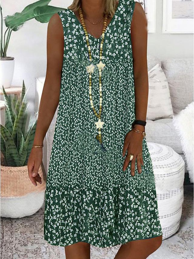 Sleeveless V-neck floral dress, green with white tiny blossoms, gathered hem