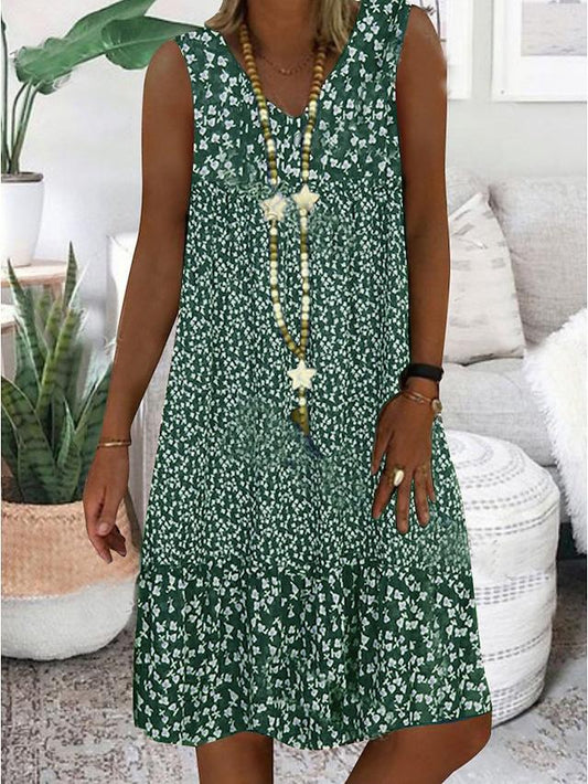 Sleeveless V-neck floral dress, green with white tiny blossoms, gathered hem