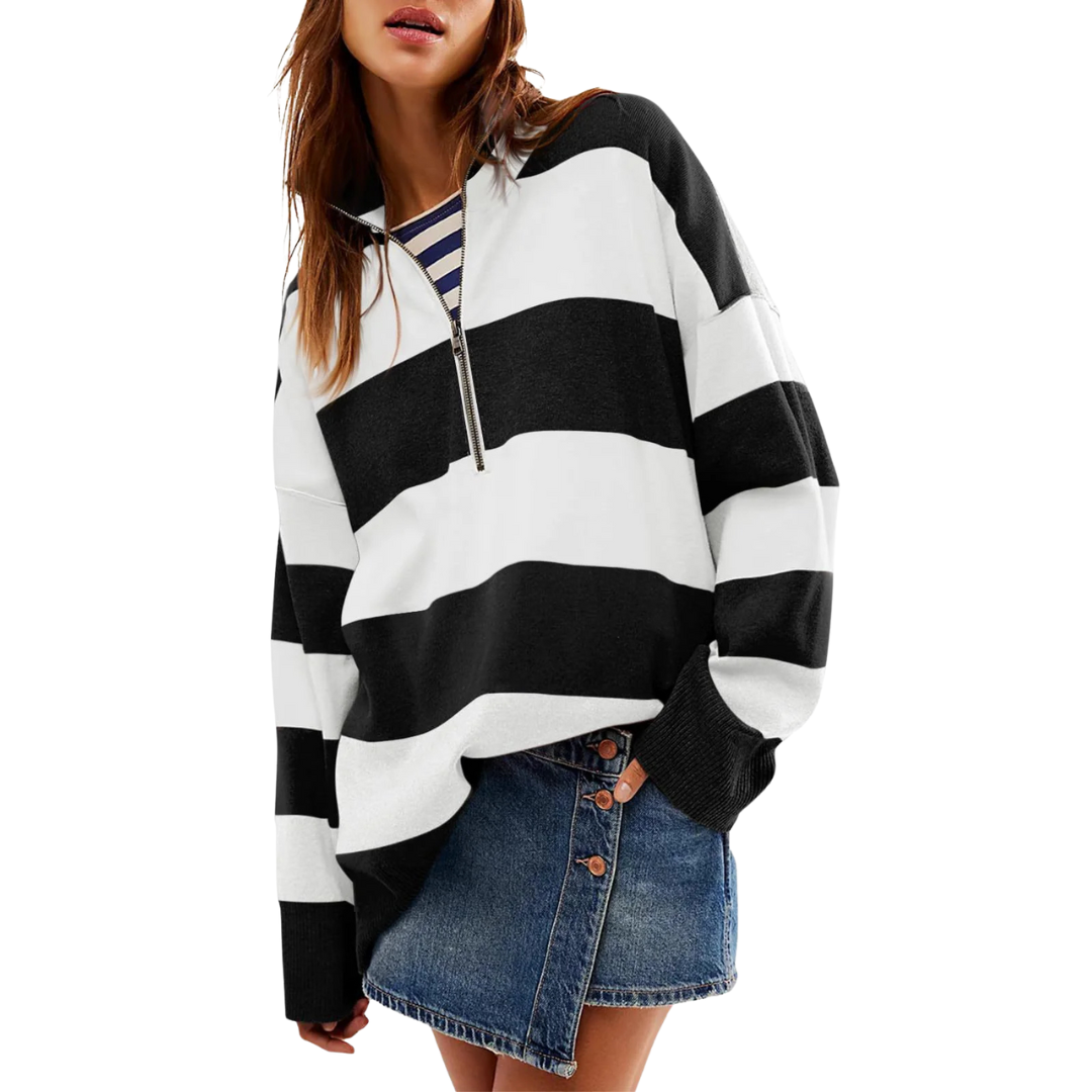 Long-sleeve pullover sweater with half-zip, black and white bold stripe pattern.