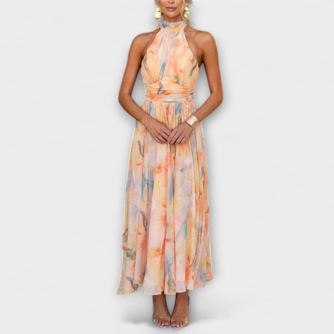 Maxi dress with halter neckline, sleeveless, pastel floral print and gathered waist