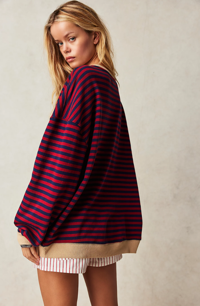 Striped sweater in navy and red horizontal stripes, relaxed fit with ribbed hem and cuffs