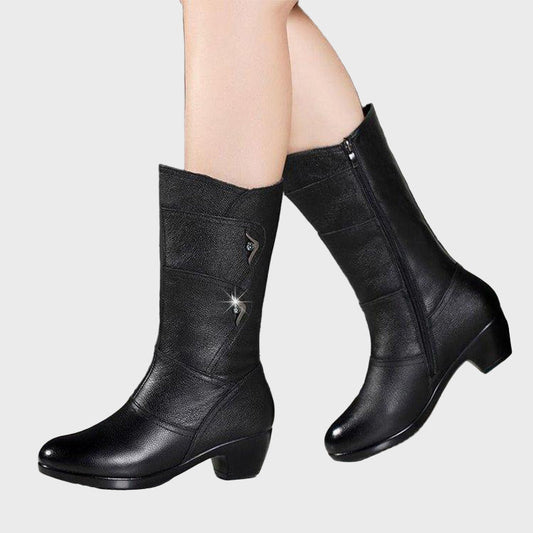 Black zip-up ankle boots with mid block heel and lace-up strap details