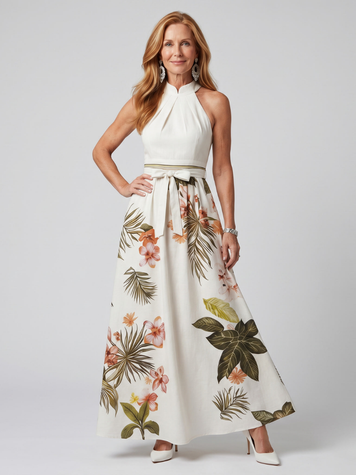 White draped halter maxi dress with botanical print skirt and waist tie
