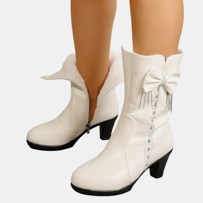 Vintage bow leather boots, white, side view with block heel and lace-up bow detail