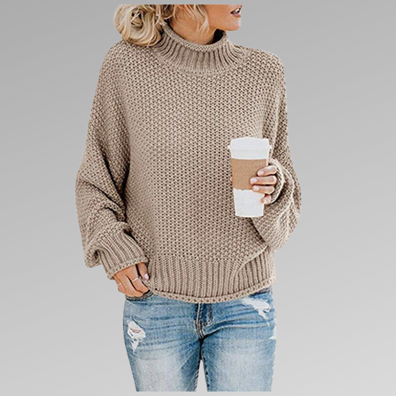 Light beige oversized winter sweater, chunky knit, ribbed turtleneck cuffs