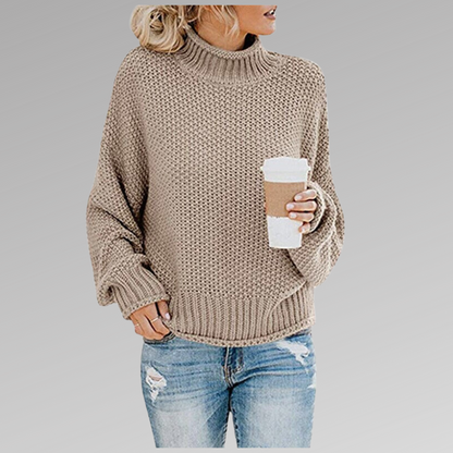 Light beige oversized winter sweater, chunky knit, ribbed turtleneck cuffs