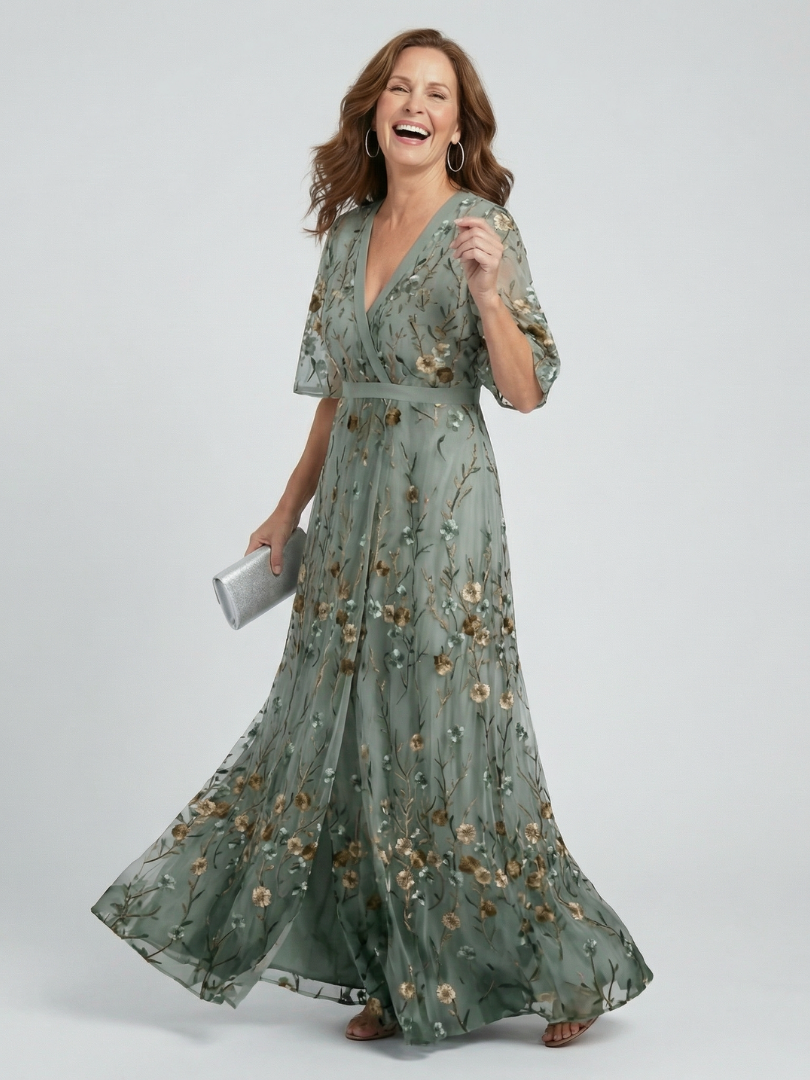 Sage green maxi dress with V-neck, flutter sleeves, floral print, tie waist