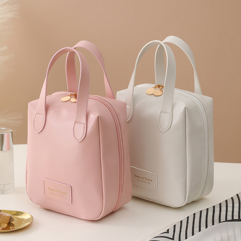 Pink and white multifunctional travel bags with zip closure and front logo patch