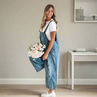 Vintage-wash denim adjustable jumpsuit, light blue with bib pocket and button straps
