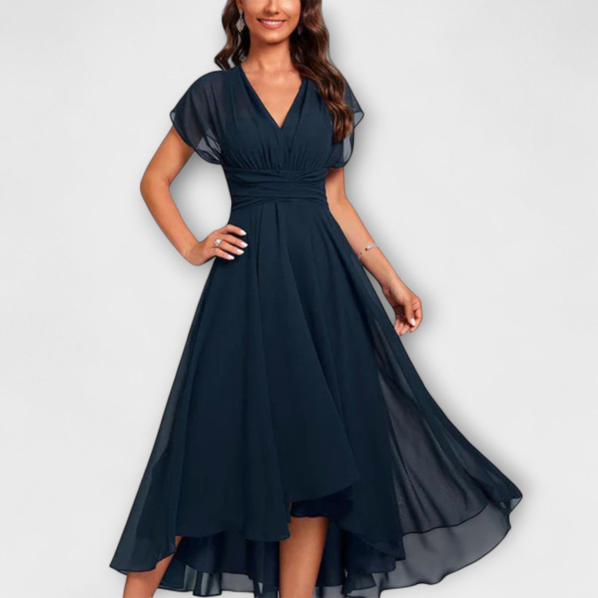 Navy V-neck maxi dress with short flutter sleeves and gathered waist, flowing skirt