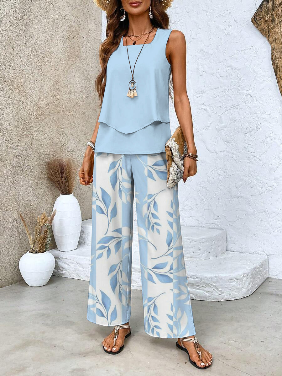 Light blue sleeveless blouse and wide-leg leaf-print trousers, two-piece set