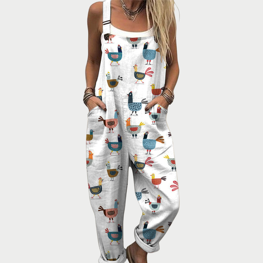 White bird-printed cotton overalls with wide bib front and adjustable straps