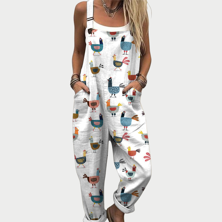 White bird-printed cotton overalls with wide bib front and adjustable straps