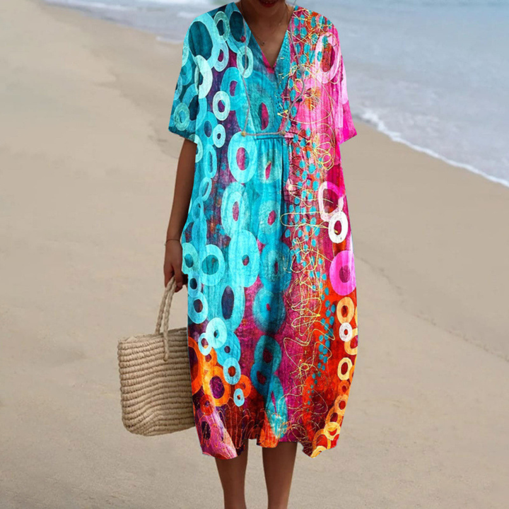 V-neck tie-dye summer dress with short sleeves, turquoise and pink swirl pattern