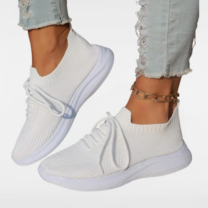 White knit lace-up sneakers with round toe and chunky cushioned sole