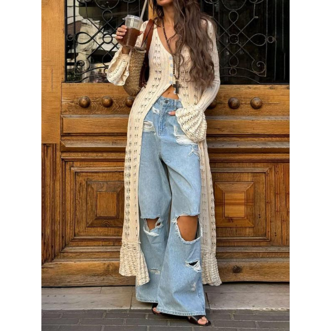 Apricot fitted cardigan with flounce sleeves and button front, open knit