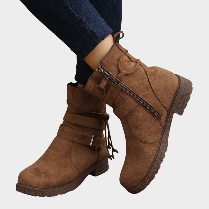 Brown suede low-heel ankle boots with side zipper and lace-up ankle strap