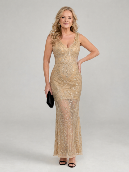 Beige sequin sleeveless midi dress with sheer panel, V-neck, and fitted bodice
