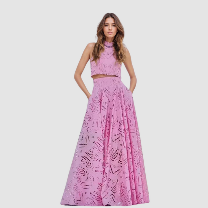 Pink sleeveless lace crop top and maxi skirt two-piece set with eyelet pattern