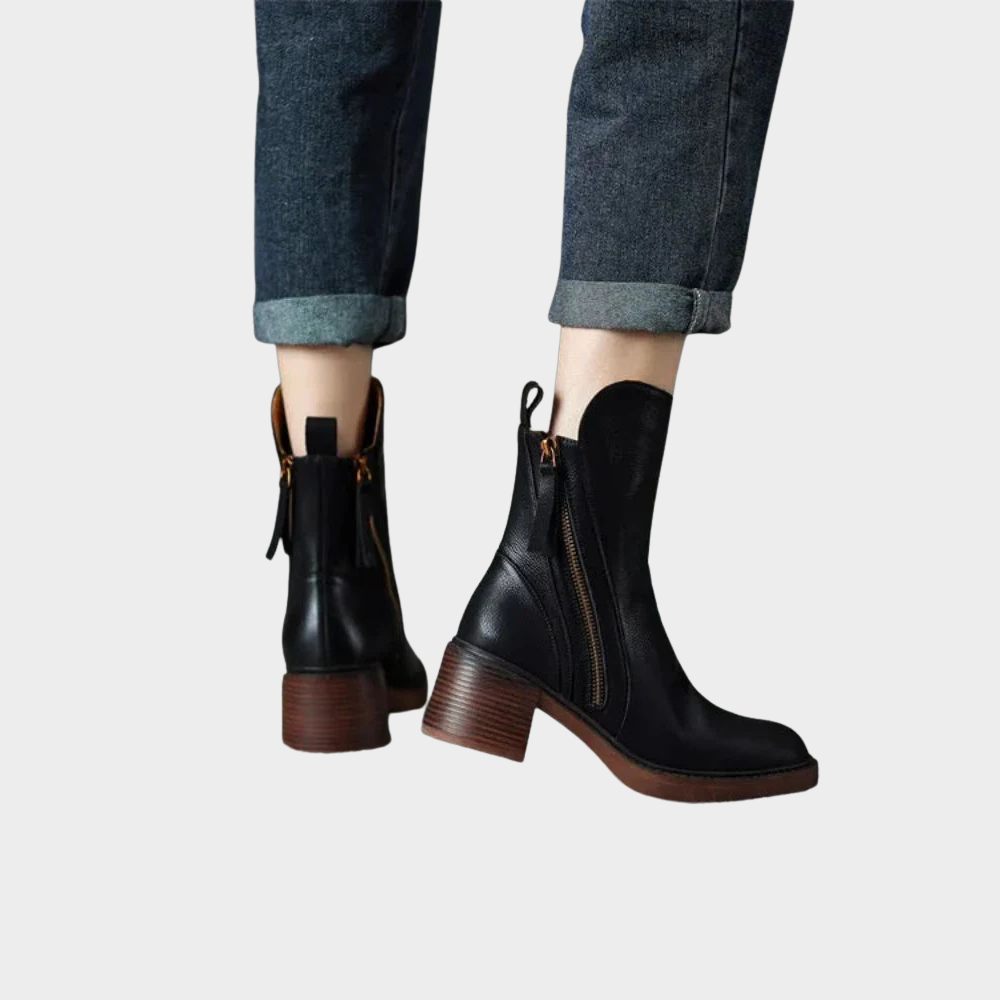 Black leather ankle heeled boots with side zip, brown block heel, rear view