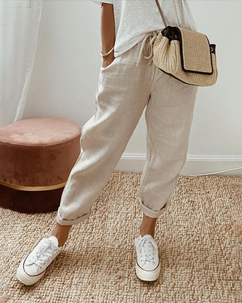 Beige retro comfort pants with drawstring waist and relaxed straight legs