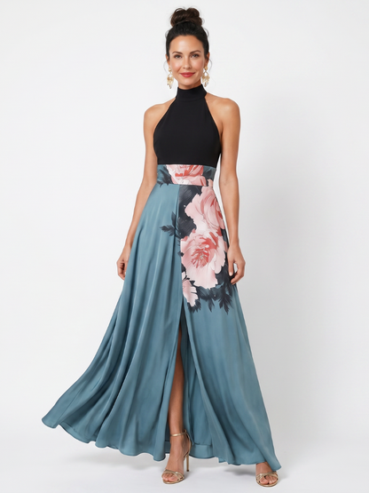 Black halter maxi dress with teal floral skirt panel and side slit