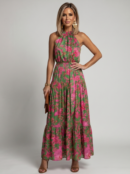 Floral halter midi dress with pink flower print, draped neckline, and tiered skirt.