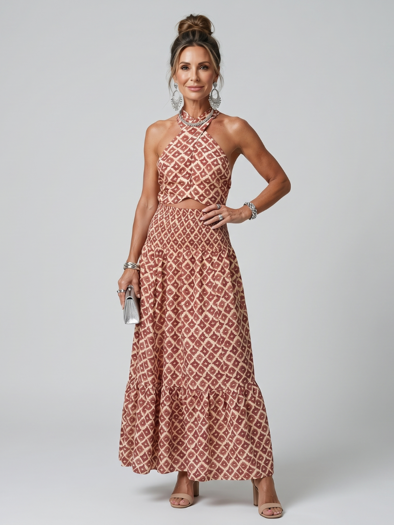 Dusty rose geometric print halter midi dress with cross neckline cutouts and tiered skirt