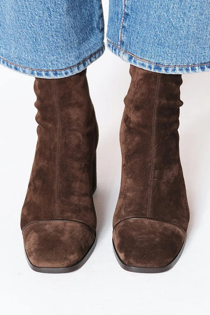 Dark brown suede mid-calf pull-on boots with stitched sides and almond toe
