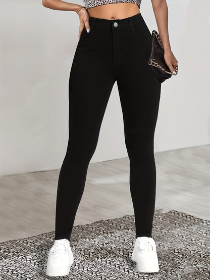 Black high-waist skinny jeans with front button, slim leg fit and side pockets