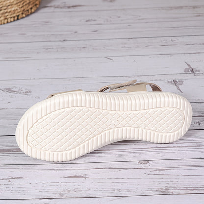 Apricot sandal outsole with textured tread and ridged pattern on the platform sole