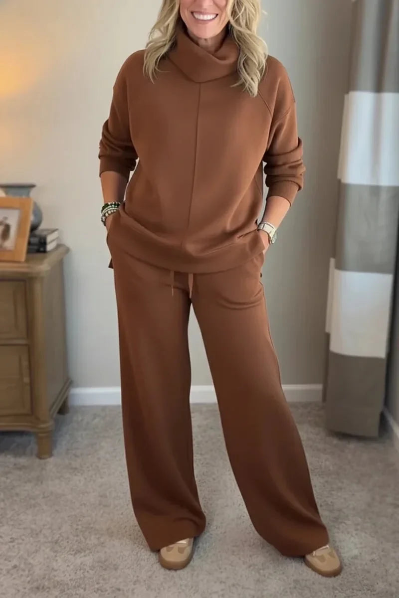 Brown coordinated zip-front hoodie top and wide-leg pants set.