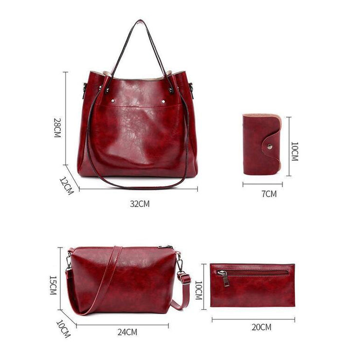 Red tote bag with top handles and matching wallet and small pouch set