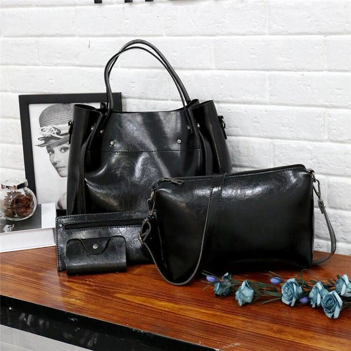 Women’s retro 4-piece bag set in black: structured tote, shoulder bag, crossbody, wallet.