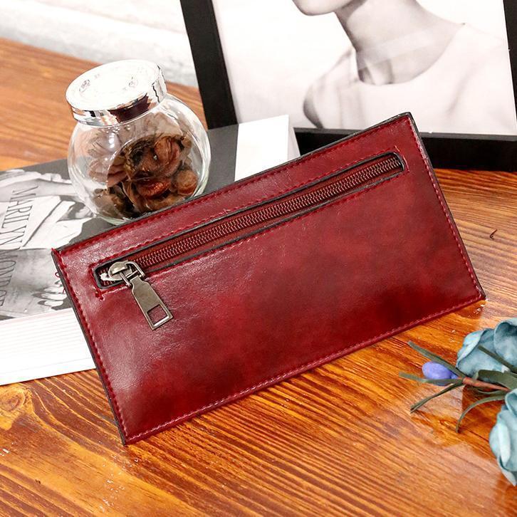 Red retro clutch wallet with zip pocket and metal clasp closure