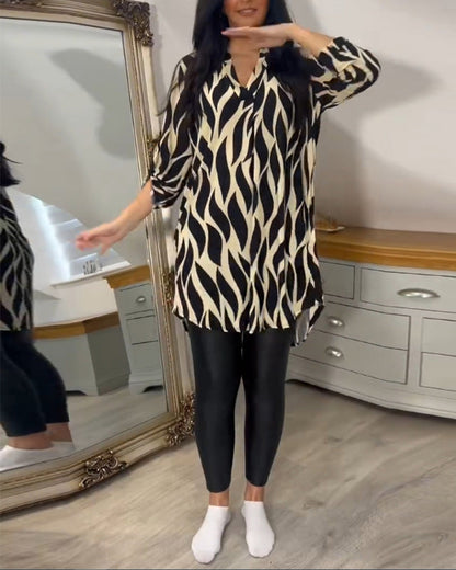 Printed loose-fit top with V-neck and zebra-style abstract print, loose drape