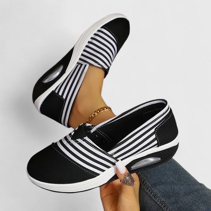 Anika orthopedic slip-on sneakers, black with white striped instep and low wedge sole