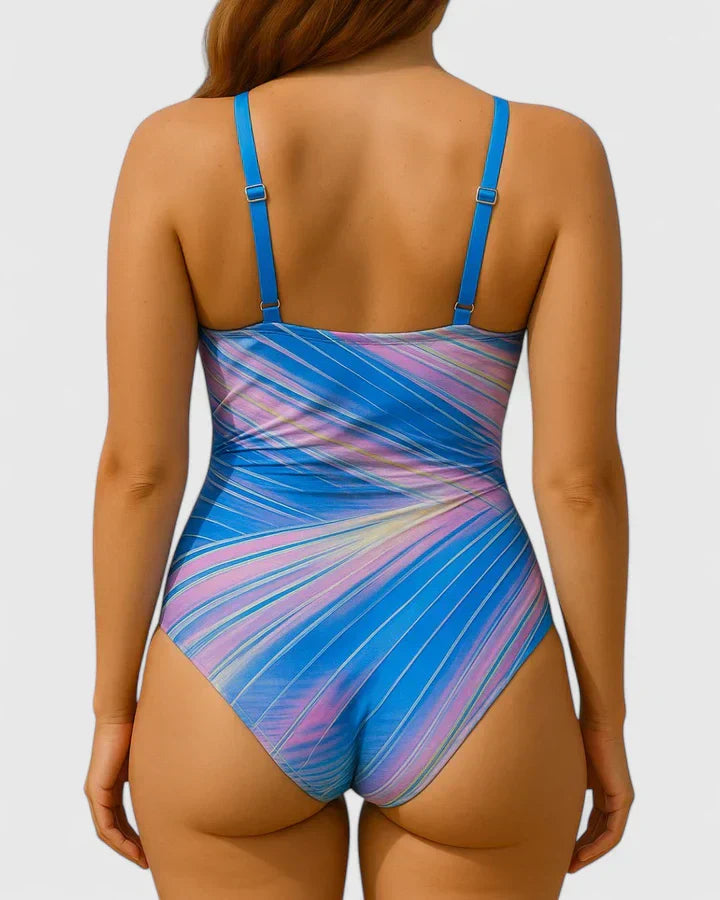 Blue and rainbow striped one-piece swimsuit with adjustable shoulder straps, back view