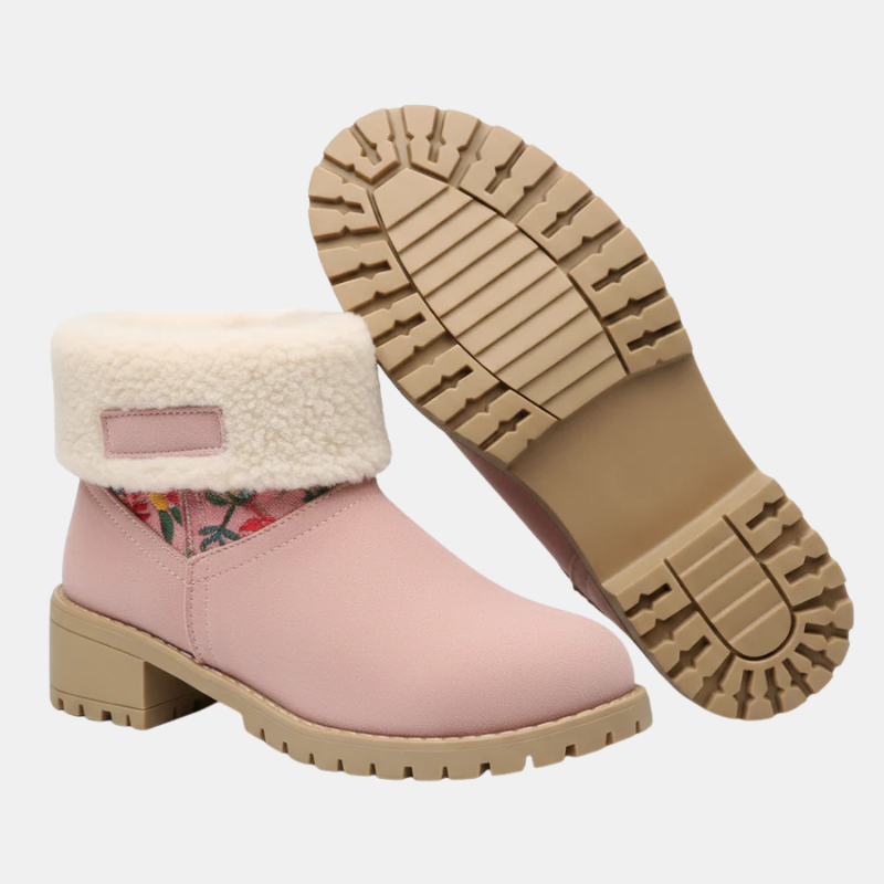 Block-heeled ankle boots in blush pink with cream sherpa cuff and lug sole.