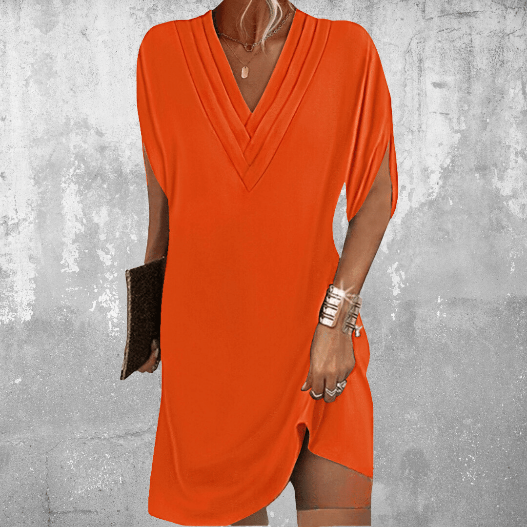 Tummy covering dress in orange, V-neck, draped short sleeves, side slit hem