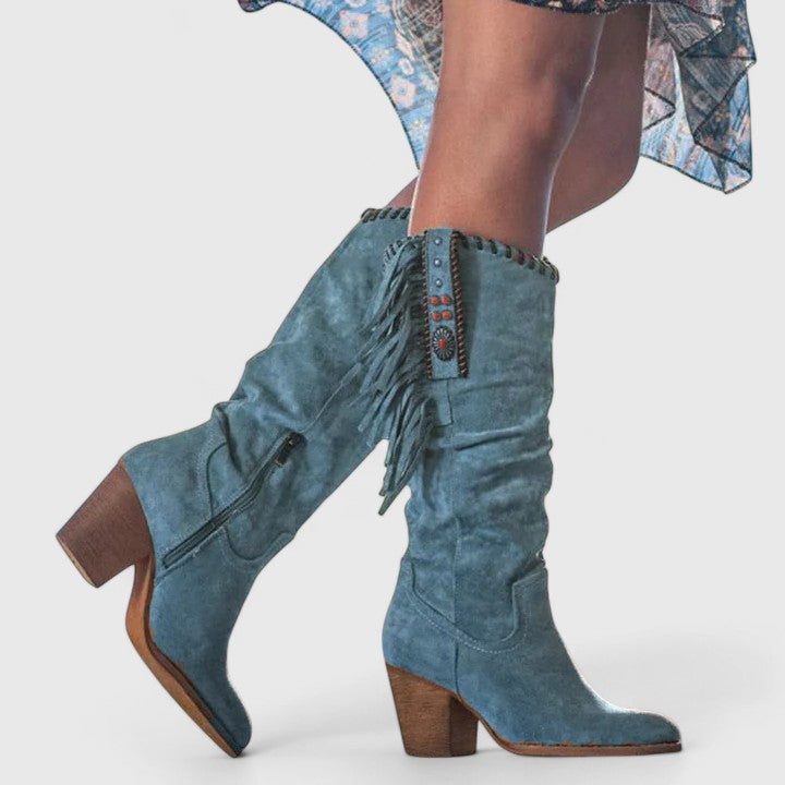 Blue suede block heeled tall boots with tassel detail and decorative strap
