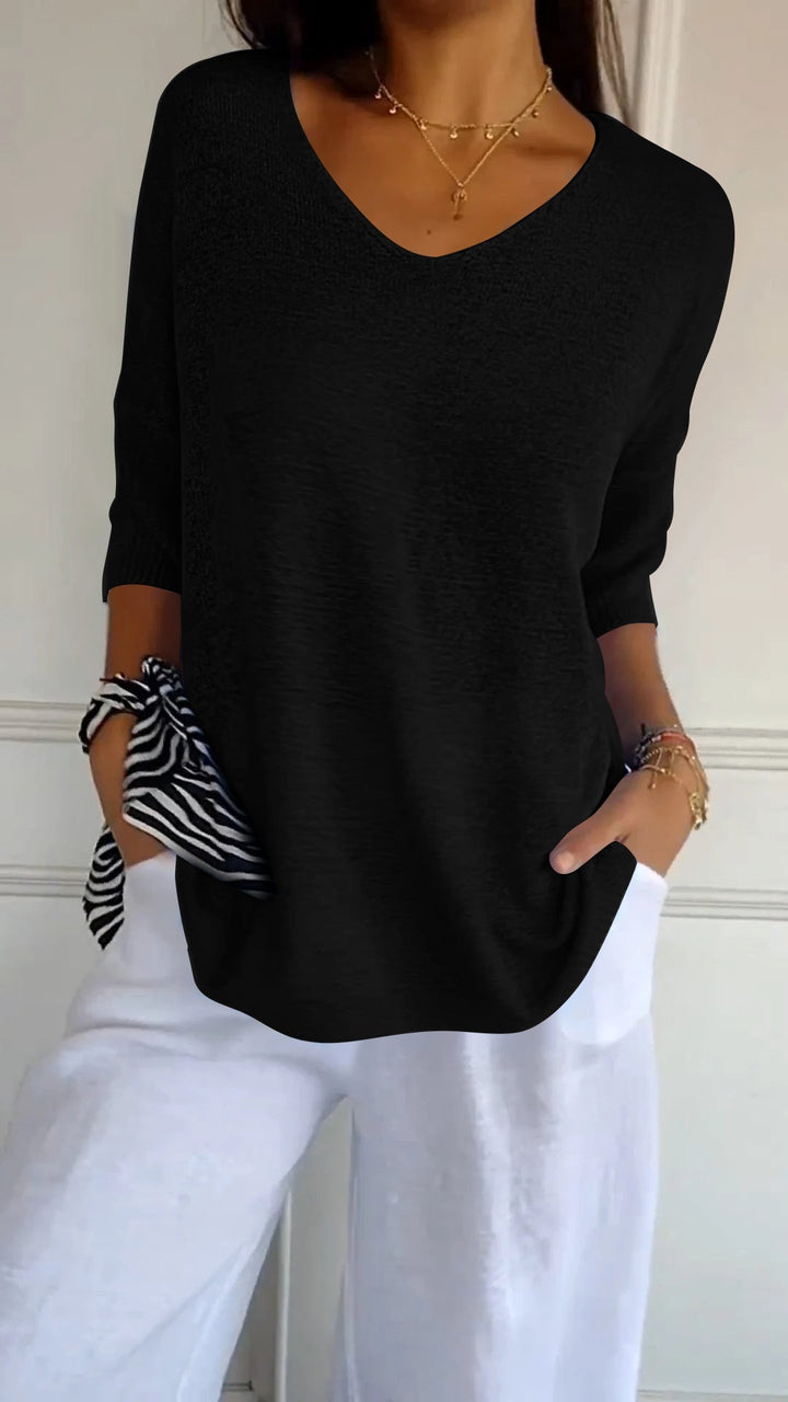 Women’s casual V-neck knit top in black, 3/4 sleeves and roomy drape