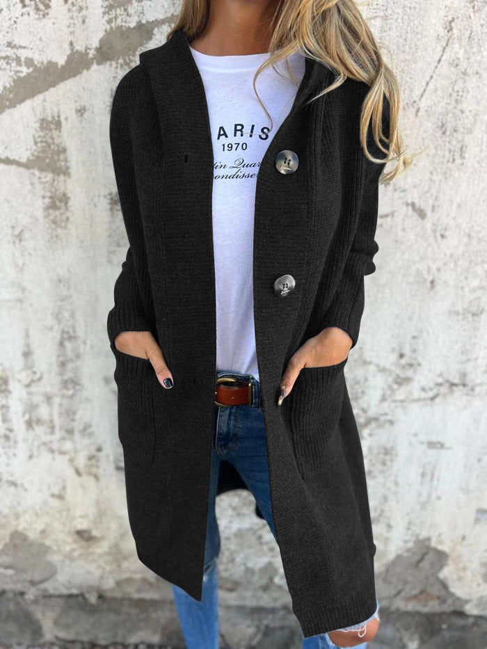 Black long knit cardigan with hood, ribbed cuffs, and button-up center front.