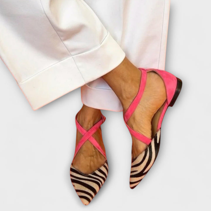 Pink band loafers with zebra-print pointed toe and low black heel