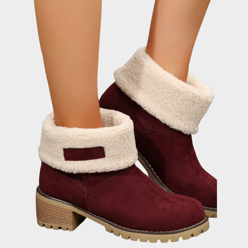 Burgundy winter ankle boots with thick faux-sherpa trim, block heel, and treaded sole