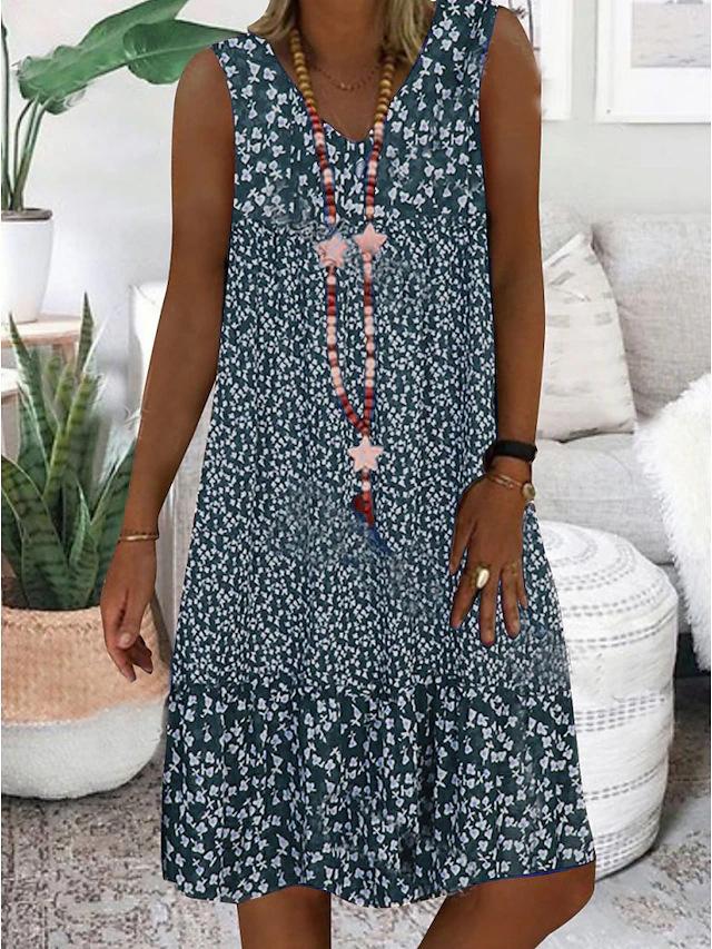 Sleeveless V-neck floral dress, blue with white tiny blossoms, gathered hem