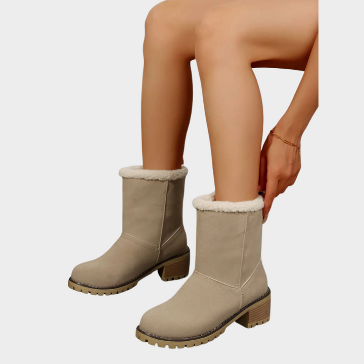 Taupe suede mid-heel winter boots with thick white sherpa cuff and block heel