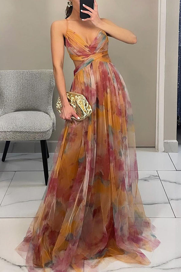 Multicolor maxi dress with V-neck bodice and pleated sheer skirt, side standing