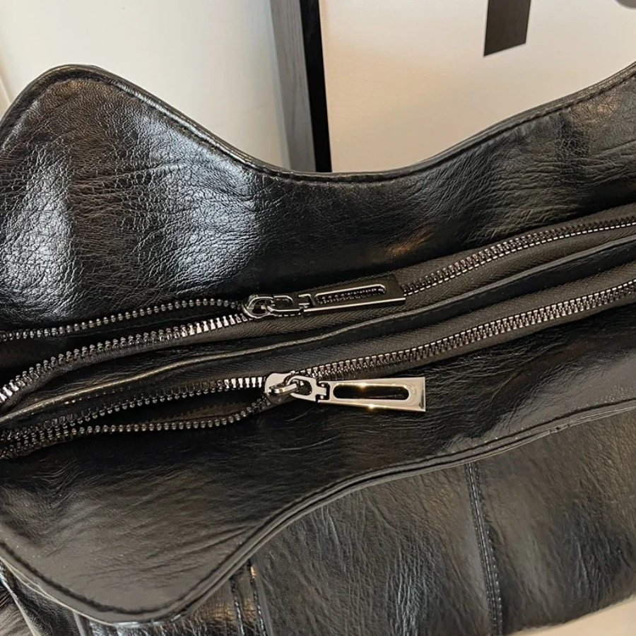 Dual-zipper large-capacity shoulder bag, black with front zipper pulls and zipper track